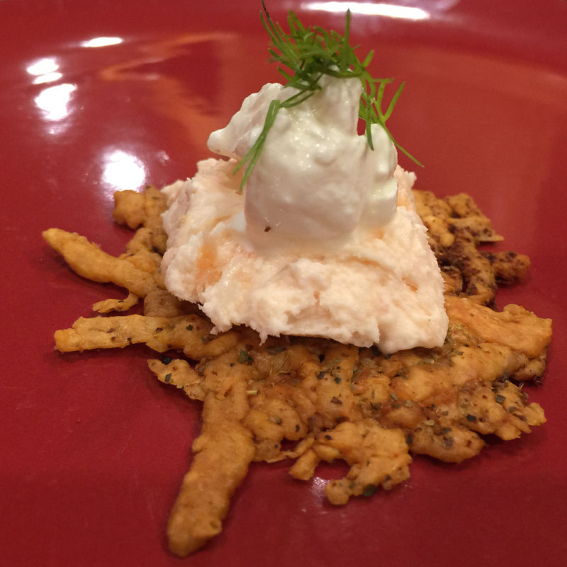 Smoked Salmon pâté with sour cream and dill on a cheese crisp